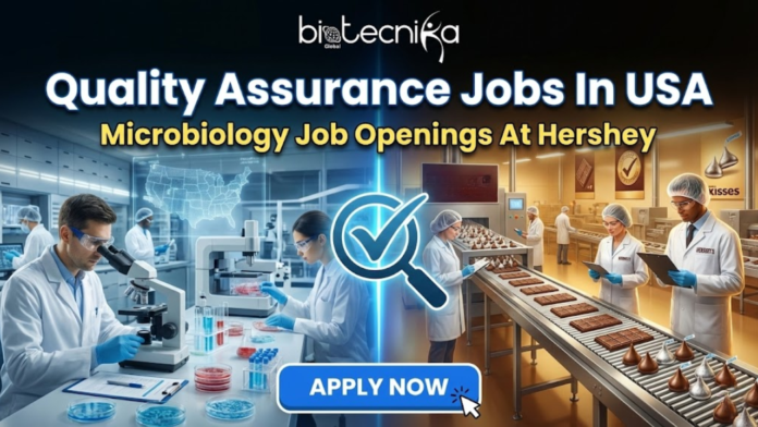 Quality Assurance Jobs In USA | Microbiology Jobs At Hershey. Featured image displaying "Quality Assurance Jobs In USA" and "Microbiology Job Openings At Hershey" with the Biotecnika Global logo at the top and an Apply Now button at the bottom, set against a professional corporate background.