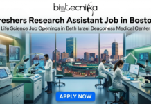 Freshers Research Assistant Job in Boston | Life Science Candidates Apply Today Freshers Research Assistant Job in Boston | Life Science Careers. Featured image for a Life Science job opening titled "Freshers Research Assistant Job in Boston" at Beth Israel Deaconess Medical Center. The graphic displays a modern, high-tech laboratory with scientists working against a backdrop of the Boston city skyline. It features the Biotecnika Global logo at the top and a prominent "APPLY NOW" button at the bottom.