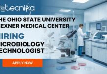 Microbiology Jobs at The Ohio State University Wexner Medical Center USA | Apply for Microbiology Technologist Role Microbiology Technologist working in a clinical microbiology laboratory with diagnostic testing equipment.