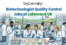 Biotechnologist Quality Control Jobs in UK | Lallemand Hiring Now Biotechnologist Quality Control Jobs in UK Lallemand Hiring Now. An illustration for a "Biotechnologist Quality Control Jobs at Lallemand UK" listing by Biotecnika Global. The image shows a diverse group of scientists in a modern laboratory, wearing lab coats and safety glasses. They are working with various equipment, including microscopes, petri dishes, test tubes, and large fermentation tanks. In the background, a large window looks out onto a green landscape with a factory building and a Union Jack flag. The title text is in bold blue and green letters at the top.