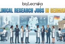 Clinical Research Jobs in Germany | IQVIA Hiring BS Life Sciences Candidates Clinical Research Jobs in Germany IQVIA Hiring BS Life Sciences Candidates. A professional featured image with the Biotecnika Global logo at the top, followed by large text reading "CLINICAL RESEARCH JOBS IN GERMANY" in blue and yellow gradient letters. The illustration depicts a diverse group of clinical researchers and professionals in lab coats and business suits collaborating in a high-tech environment. Behind them, a large digital screen displays clinical trial data, graphs, and a map of Germany with location markers. The background blends modern Berlin city architecture, including the TV Tower, with the historic Brandenburg Gate and a German flag.