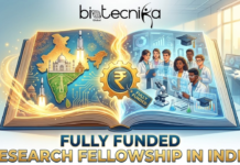 Fully Funded Research Fellowship in India | ISRF Program 2025–26 Fully Funded Research Fellowship in India 2025–26 ISRF Program. A promotional banner for "Fully Funded Research Fellowship in India" by Biotecnika Global. The "Biotecnika Global" logo is at the top center. The main visual is a large, glowing open book. The left page features a stylized map of India, the Taj Mahal, a rocket, and circuits with golden light. The right page shows a diverse group of researchers in a lab with microscopes, data screens, and graduation caps. In the center, a gear with the Indian Rupee symbol (₹) and a tag labeled "FULLY FUNDED" is present. The text "FULLY FUNDED RESEARCH FELLOWSHIP IN INDIA" is at the bottom.