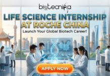 Life Science Internship at Roche | Explore Internships in China Life Science Internship at Roche China. A professional featured image for Biotecnika Global titled "LIFE SCIENCE INTERNSHIP AT ROCHE CHINA." The scene shows a group of young scientists in white lab coats working in a high-tech laboratory with futuristic holographic displays of DNA and a map of China. Through the large glass windows, the Shanghai skyline is visible, featuring the Oriental Pearl Tower and the Shanghai Tower. A large orange "APPLY NOW" button is positioned at the bottom.