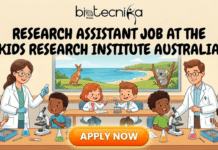 Research Assistant Jobs in Australia | Latest Life Sciences Careers Opportunities Research Assistant Jobs in Australia | Life Sciences Careers. A featured image for Biotecnika Global titled "RESEARCH ASSISTANT JOB AT THE KIDS RESEARCH INSTITUTE AUSTRALIA" in bold black font. The playful illustration shows two researchers in lab coats guiding a group of children through fun science experiments with microscopes and colorful flasks. In the background, a window looks out onto an Australian beach scene featuring a kangaroo and a koala. A large orange "APPLY NOW" button is centered at the bottom.