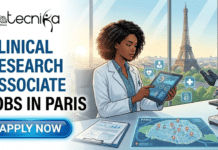 Clinical Research Associate Jobs at Fortrea Paris | Don’t Miss This Opportunity Clinical Research Associate Jobs at Fortrea Paris Don’t Miss. A featured image for a job posting titled "Clinical Research Associate Jobs in Paris." The image depicts a professional female scientist in a white lab coat working in a sleek, modern laboratory. She is analyzing data on a handheld tablet, with a microscope and a map of Paris visible on her desk. Through a large window in the background, the Eiffel Tower and the Paris skyline are clearly visible under a bright sky. The Biotecnika Global logo is placed at the top left, and a prominent blue "Apply Now" button is located at the bottom left.
