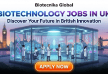 Latest Biotechnology Jobs in UK | Apply For Research Technician at University of Birmingham Latest Biotechnology Jobs in UK. A promotional graphic by Biotecnika Global titled "BIOTECHNOLOGY JOBS IN UK" in glowing blue and purple text, with the subtitle "Discover Your Future in British Innovation." The central illustration shows a futuristic, glass-walled laboratory filled with diverse scientists working with advanced equipment and holographic displays of DNA and data. The lab is situated outdoors at twilight, overlooking the River Thames with iconic London landmarks, including Big Ben, the Houses of Parliament, and Tower Bridge, visible in the background. At the bottom center is a large, glowing orange button with the white text "APPLY NOW."