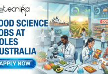 Food Science Jobs in Australia | Apply For Product Technologist Role at Coles Food Science Jobs in Australia Apply For Product Technologist Role at Coles. A featured image for a job posting titled "Food Science Jobs at Coles Australia." The image depicts a bright, high-tech food innovation laboratory where scientists in white coats are analyzing fresh produce and packaged goods. Key visual elements include: Background: Large windows offer a view of the Sydney Opera House and lush Australian vineyards. Foreground: A scientist uses a microscope next to fresh mangoes and avocados, while another examines a Coles-branded snack product. Branding: The Biotecnika Global logo is positioned at the top left, and a "Coles" branded retail shelf is visible in the background. Call to Action: A large, glowing blue "Apply Now" button is located at the bottom left. Style: A vibrant and professional digital illustration blending scientific research with the food retail industry.