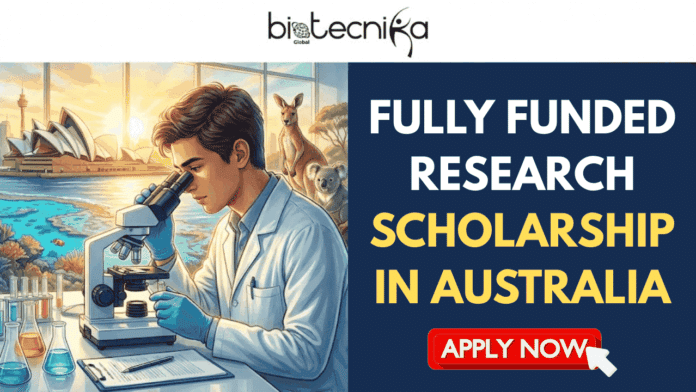 Fully Funded Research Scholarship in Australia Apply For PhD in Nanotechnologies. A promotional graphic with the Biotecnika Global logo at the top. On the left, an illustration shows a scientist looking into a microscope, set against a backdrop of Australian icons including the Sydney Opera House, a kangaroo, and a koala. On the right, large gold and white text reads,