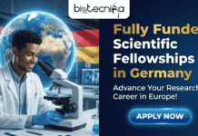 Fully Funded Scientific Fellowships in Germany | Apply for Bayer Fellowships 2026 Fully Funded Scientific Fellowships in Germany Apply for Bayer Fellowships 2026. A promotional banner for Biotecnika Global. On the left, a smiling male scientist in a lab coat looks into a microscope, with a globe and the German flag in the background. On the right, against a dark blue background, large text reads "Fully Funded Scientific Fellowships in Germany". Below it, smaller text says "Advance Your Research Career in Europe!". At the bottom right is a prominent blue button with "APPLY NOW" in white text.