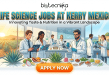 Life Science Jobs at Kerry Mexico | Graduates Don’t Miss This Opportunity Life Science Jobs at Kerry Mexico Graduates Don't Miss This Opportunity. A professional recruitment banner for Biotecnika Global titled "LIFE SCIENCE JOBS AT KERRY MEXICO" in glowing blue and gold text, with the subtitle "Innovating Taste & Nutrition in a Vibrant Landscape." The illustration shows a diverse team of six scientists in a modern laboratory, working with equipment alongside fresh ingredients like agave plants, dragon fruit, papaya, and various spices. Large windows in the background reveal a sunny Mexican agave field and a traditional hacienda. A prominent orange "APPLY NOW" button is at the bottom.