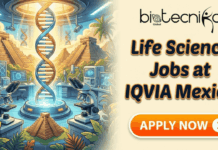 Life Science Jobs in Mexico You Can’t Miss | IQVIA Hiring Now Life Science Jobs in Mexico You Can’t Miss IQVIA Hiring Now. A promotional banner for "Life Science Jobs at IQVIA Mexico." At the top right is the "biotecnika Global" logo. The left half features a stylized illustration of a futuristic science laboratory with a large DNA double helix, microscopes, and computer screens, set against a backdrop of Mayan pyramids and jungle foliage. The right half has large orange text reading "Life Science Jobs at IQVIA Mexico" above a prominent orange button labeled "APPLY NOW". The overall theme blends modern biotechnology with ancient Mexican culture.
