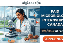 Paid Microbiology Internship in Canada – $25/Hour at Ferrero! Paid Microbiology Internship in Canada – $25Hour at Ferrero! A promotional graphic for a "Paid Microbiology Internship in Canada" at Ferrero, offering $25/hour. The image features an AI-generated illustration of a female scientist in a white lab coat using a microscope in a high-tech laboratory. The lab overlooks a city skyline featuring the CN Tower. On the lab bench are petri dishes, test tubes, hazelnuts, and cocoa beans. The right side of the image contains bold text with the job details and an orange "APPLY NOW" button, while the "Biotecnika" logo is displayed at the top.