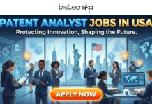 Patent Analyst Jobs in USA | Explore The Global Career Opportunity at Clarivate Patent Analyst Jobs in USA Explore The Global Career Opportunity at Clarivate. A professional recruitment banner for Biotecnika Global titled "PATENT ANALYST JOBS IN USA" in glowing blue and gold text, with the subtitle "Protecting Innovation, Shaping the Future." The illustration features a diverse team of patent professionals in business attire working in a modern, high-tech office. They are analyzing data on large digital screens filled with patent documents, legal icons (scales, gavel), lightbulbs, and global maps. The background through panoramic windows shows the New York City skyline, the Statue of Liberty, and an American flag. A large orange "APPLY NOW" button is centered at the bottom.