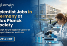 Top Scientist Jobs in Germany at Max Planck Society | Apply Before They Close! Scientist Jobs in Germany at Max Planck Society Don't Miss It. Gemini said A promotional banner for Biotecnika Global, featuring large white text on a blue background that reads "Scientist Jobs in Germany at Max Planck Society" and "Launch Your Research Career in Europe's Premier Institutes." Below the text is a blue and gold "APPLY NOW" button. On the right side, a female scientist in a white coat and gloves looks into a microscope in a modern laboratory setting, with multiple screens and test tubes on the desk. Through a large window, a contemporary research institute building and a city skyline are visible under a clear sky. The Biotecnika Global logo is in the top left corner.