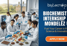 Top Biochemistry Internship in UK 2026–27 | Mondelēz Offers Starting Salary of £23,000 Top Biochemistry Internship at Mondelēz UK Earn Upto £23,000. Gemini said A promotional image for a "Biochemistry Internship at Mondelēz UK" features a group of diverse scientists in a modern laboratory setting, examining various food samples, including chocolates and fruits, with scientific equipment. The text "Biochemistry Internship at Mondelēz UK" and "Fuel Your Career in Food Science & Innovation." is prominent, along with the Biotecnika Global logo and a large "APPLY NOW" button.