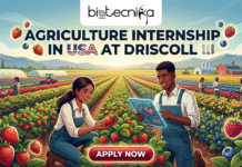 Agriculture Internship at Driscoll in USA | Full-time Student Internship for Life Science Graduates Agriculture Internship at Driscoll USA Life Science Graduates. A stylized vector illustration for an agricultural internship job page. The image features the 'biotecnika Global' logo at the top center, with a prominent title below it: 'AGRICULTURE INTERNSHIP IN USA AT DRISCOLL'. In the foreground, two smiling young interns, a woman and a man, happily observe a strawberry and check data on a tablet. They are surrounded by multi-row fields of strawberries, blueberries, and raspberries. In the background are a farm with barns, other workers, a distant tractor, hoop houses, and distant hills. Scattered berry clusters frame the scene. At the bottom center, a glowing button reads 'APPLY NOW'.