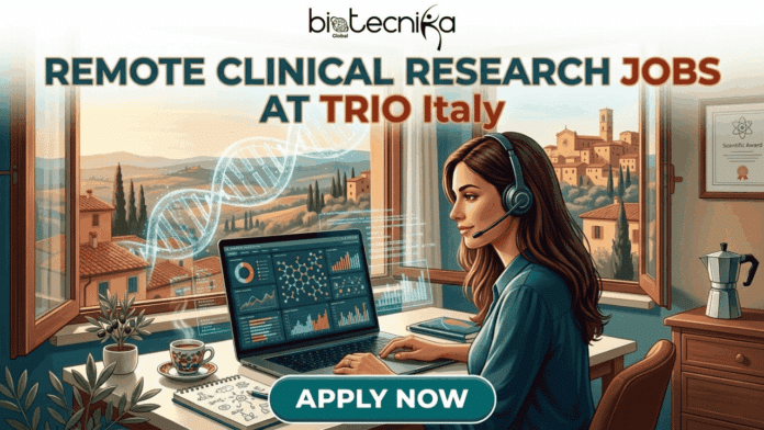 Clinical Research Jobs in Italy at TRIO. Gemini said An illustrative promotional banner for biotecnika Global. A woman with a headset is working on a laptop displaying scientific data, charts, and diagrams at a wooden desk. She is seated by a large open window with a beautiful, sun-drenched panoramic view of a traditional Italian hillside town with terracotta-roofed buildings and rolling hills. Transparent DNA double helices and data visualizations float in the air. The headline at the top reads: