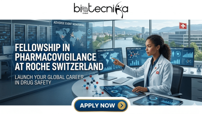 Fellowship in Pharmacovigilance at Roche Switzerland Launch Your Global Drug Safety Career! A promotional banner with the biotecnika Global logo at the top. The headline in large text reads: 'FELLOWSHIP IN PHARMACOVIGILANCE AT ROCHE SWITZERLAND', and the sub-headline states: 'LAUNCH YOUR GLOBAL CAREER IN DRUG SAFETY'. The main visual is a woman in a lab coat sitting at a curved high-tech desk and pointing at one of five large computer monitors. The monitors display detailed pharmacovigilance data, global adverse event monitoring maps, chemical structures, and public health impact charts. Through a large, panoramic window behind her, there is a clear view of the city of Basel, Switzerland, with the Rhine River, Roche tower, mountains, and a Swiss flag. At the bottom center, there is a prominent blue and orange 'APPLY NOW' button with an arrow. The text at the bottom corners includes hashtags like #DrugSafetyFellowship, #Pharmacovigilance, and #SwissInnovation.