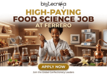 High-Paying Food Science Job at Ferrero – Hybrid R&D Product Developer Role in the USA You Can’t Miss! High-Paying Food Science Job at Ferrero Hybrid Jobs in USA. A promotional job advertisement banner for a food science role at Ferrero. A smiling female scientist of African descent in a modern, confectionery-themed lab is carefully pipetting chocolate onto a tray of pralines. She is surrounded by research equipment, including beakers labeled "HAZELNUT FLAVOR ANALYSIS", "COCOA MASS TEXTURE RHEOLOGY", and others. The background shows a large oven with a 3D-printed chocolate basket and shelves with various chocolate creations. The main banner text reads "HIGH-PAYING FOOD SCIENCE JOB AT FERRERO", with the "biotecnika Global" logo at the top. A gold "APPLY NOW" button is centered at the bottom, above the text "Join the Global Confectionery Leaders".
