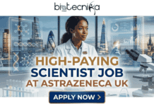 High-Paying Scientist Job at AstraZeneca UK | Apply Before Deadline! High-Paying Scientist Job at AstraZeneca UK Apply Before Deadline! A promotional featured image banner from biotecnika Global promoting a 'HIGH-PAYING SCIENTIST JOB AT ASTRAZENECA UK'. The image depicts a diverse female scientist in a white lab coat with a Union Jack flag pin, interacting with intricate floating scientific holograms (showing molecular structures, DNA helices, charts, and data) in a modern laboratory. Through massive floor-to-ceiling windows, a stunning panoramic view of the London skyline at twilight, including landmarks like The Shard and The Gherkin, is visible. A microscope is in the foreground. The 'biotecnika Global' logo is at the top, and a prominent 'APPLY NOW' button is at the bottom center.