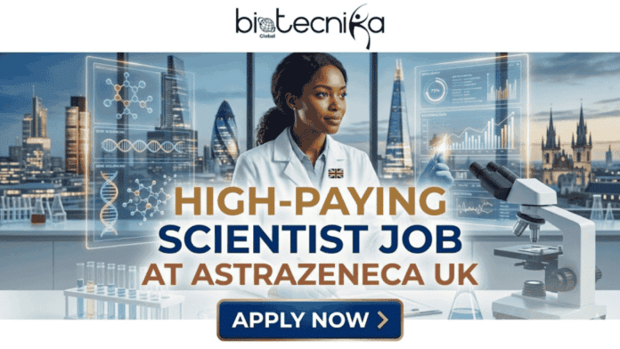 High-Paying Scientist Job at AstraZeneca UK Apply Before Deadline! A promotional featured image banner from biotecnika Global promoting a 'HIGH-PAYING SCIENTIST JOB AT ASTRAZENECA UK'. The image depicts a diverse female scientist in a white lab coat with a Union Jack flag pin, interacting with intricate floating scientific holograms (showing molecular structures, DNA helices, charts, and data) in a modern laboratory. Through massive floor-to-ceiling windows, a stunning panoramic view of the London skyline at twilight, including landmarks like The Shard and The Gherkin, is visible. A microscope is in the foreground. The 'biotecnika Global' logo is at the top, and a prominent 'APPLY NOW' button is at the bottom center.