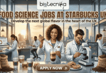 Hybrid Food Science Jobs in UK Revealed! Starbucks Hiring Beverage Product Developer in London Hybrid Food Science Jobs in UK Revealed! Starbucks Hiring Beverage Product Developer in London. A detailed promotional banner for "Food Science Jobs at Starbucks UK" by biotecnika Global. The top banner features the logo and text. Below it, a high-tech coffee and food research lab is set against a stunning, sunset view of the London skyline, including iconic buildings like The Shard. In the foreground, two attractive scientists are focused on their work at a lab counter. A smiling woman, with a Great Britain flag patch on her lab coat, uses a micropipette to analyze a complex coffee drink, while a man next to her in a lab coat looks into a sophisticated microscope, with a monitor nearby showing molecular diagrams for texture analysis. The counter is covered with sacks labeled "ARABICA QUALITY RESEARCH", Starbucks-style coffee cups, various beakers, and a detailed swirl pastry. In the background, other diverse scientists are working at stations for "Flavor Profiling" and "Beverage Architecture Console". A large, central "APPLY NOW" button with a forward-facing arrow is at the bottom of the banner. The text at the top reads: "FOOD SCIENCE JOBS AT STARBUCKS UK" and "Develop the next global flavor in the heart of the UK"