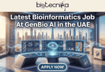 Latest Bioinformatics Job Alert: GenBio AI Hiring in UAE for Next-Gen AI Biology! Latest Bioinformatics Job Alert GenBio AI Hiring in UAE for Next-Gen AI Biology!. A featured image banner from biotecnika Global promoting a new job. At the top center is the "biotecnika Global" logo. The main headline text reads: "Latest Bioinformatics Job At GenBio AI in the UAE". The image depicts a technologically advanced bioinformatics workstation with three large, holographic curved monitors displaying genetic data, phylogenetic trees, heatmaps, and a stylized AI brain with neural pathways. The workstation is positioned in a modern office with large windows overlooking a sunlit desert landscape with palm trees on the sides and a detailed, iconic UAE city skyline in the center. Smaller side units with a glowing stylized eagle head logo are present. At the bottom center, a prominent rounded blue button with bold white text reads "APPLY NOW".