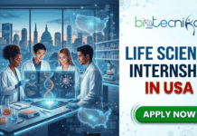 Life Science Internship in USA | Cook Medical Hiring Quality Assurance Intern Life Science Internship in USA QA Intern at Cook Medical. A split-panel marketing graphic. The left side features a group of four diverse young scientists in a modern laboratory, collaborating around an interactive holographic display that visualizes DNA structures, molecular data, and a map of the United States. Through a large window in the background, a prominent American city skyline including the US Capitol is visible at dusk. The right side contains the text and branding: "BIOTECNIKA GLOBAL" logo at the top, followed by bold lettering "LIFE SCIENCE INTERNSHIP IN USA," and a prominent green "APPLY NOW" button at the bottom. The entire visual is high-tech, vibrant, and inviting.