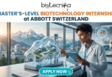 Master’s-Level Biotechnology Internship at Abbott Switzerland | Apply Now Master’s-Level Biotechnology Internship at Abbott Switzerland Apply Now "A modern, vibrant featured image for a job page. At the top, the biotecnika Global logo is placed next to the prominent title text in large, bold, blue and orange font: 'MASTER’S-LEVEL BIOTECHNOLOGY INTERNSHIP at ABBOTT SWITZERLAND'. The central image shows a diverse young male scientist (in a lab coat with a Swiss flag pin) actively interacting with unique, glowing, transparent, multi-tiered cell culture equipment featuring complex, bio-illuminated internal paths that resemble mountain trails. He is pointing with one hand at the equipment and holding a tablet in the other, with a floating holographic display of scientific cell data in front of him. Through a large, floor-to-ceiling lab window behind them, a breathtaking and clear view of snow-capped Swiss Alps, a river, and a modern city skyline is visible at sunrise. Benches hold a microscope and other lab tools, including a spiral notebook with handwritten German and French notes. At the bottom center, a rounded blue-green button with white text reads 'APPLY NOW' with a pointer icon. The overall style is high-tech, clean, and ambitious."