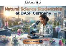 Natural Science Studentship at BASF Germany – Don’t Miss This Career Boost! Natural Science Studentship at BASF Germany – Don’t Miss This Career Boost! "An illustrative promotional banner for biotecnika Global with the central headline 'Natural Science Studentship at BASF Germany'. A focused African-American female scientist in a lab coat is sitting at a desk, looking into a microscope. The setting is a large, high-tech natural science laboratory with a window view of a modern city at golden hour. The desk is detailed with advanced microfluidic devices, beakers with colored liquids, petri dishes with iridescent crystalline organisms, and monitors displaying data charts. Floating in transparent bubbles around the scientist are chemical formulas, cell diagrams, and molecular structures. An 'APPLY NOW' button is at the bottom center, followed by the text 'JOIN THE INNOVATION HUB & SHAPE THE FUTURE.' The overall style is highly detailed digital illustration."