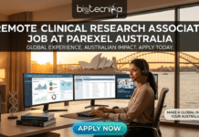 Remote Clinical Research Associate Job in Australia – Work Globally with Parexel & Fast-Track Your Career! Remote Clinical Research Associate Job at Parexel Australia. A promotional graphic for a Remote Clinical Research Associate job at Parexel Australia. It features a woman with a headset working at a desk with two monitors. Large text across the top reads: 'REMOTE CLINICAL RESEARCH ASSOCIATE JOB AT PAREXEL AUSTRALIA' and a subtitle reads 'GLOBAL EXPERIENCE, AUSTRALIAN IMPACT. APPLY TODAY.' Her desk screens show clinical data dashboards. The background window reveals a view of the Sydney Opera House and Harbour Bridge. A blue button at the bottom center says 'APPLY NOW.' The biotechnika logo is at the top.