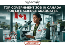 Top Government Job in Canada for Life Science Graduates – Be a Part of Canadian Armed Forces Today! Top Government Job in Canada for Life Science Graduates – Be a Part of Canadian Armed Forces Today! An advertisement with a centered headline: "TOP GOVERNMENT JOB IN CANADA FOR LIFE SCIENCE GRADUATES" written in white text below the Biotecnika Global logo. In the middle, a focused Black woman in a white lab coat over a military uniform looks into a compound microscope. A complex red and white molecular ball-and-stick model sits on her desk, along with test tubes, a notebook, and a military-style device. In the background, there's an active military research hangar with a waving Canadian flag, other personnel in camouflage and lab coats, and a large multi-wheeled military vehicle partially visible. A large orange button at the bottom says: "APPLY NOW".